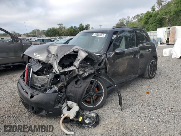 2015 MINI Countryman S with VIN WMWZC3C57FWP52868, listed as a Copart auction lot 54909085 with 68,003 mi miles and Salvage title. Bid and sale history available at DreamBid. Image 1.