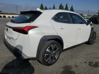 2022 Lexus UX 250h with VIN JTHX9JBH2N2056285, listed as a Copart auction lot 87221214 with 33,377 mi miles and Salvage title. Bid and sale history available at DreamBid. Image 3.