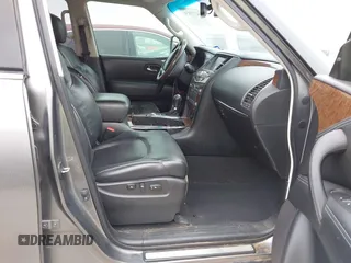 2015 Infiniti QX80 with VIN JN8AZ2NF1F9571315, listed as a IAAI auction lot 41522434 with 166,947 mi miles. Bid and sale history available at carsss.com. Image 5.