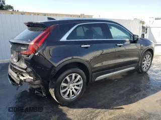 2023 Cadillac XT4 FWD Premium Luxury z VIN 1GYFZCR44PF175022, wystawiony jako Copart lot #49214855 z przebiegiem 50 234 mil mil oraz Nie do naprawy • Non repairable. Historia ofert i sprzedaży dostępna na DreamBid. Obrazek 3.