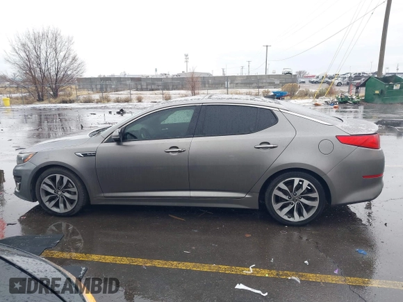 2015 Kia Optima SX Turbo with VIN 5XXGR4A66FG361755, listed as a IAAI auction lot 41199887 with 114,179 mi miles. Bid and sale history available at carsss.com. Image 14.