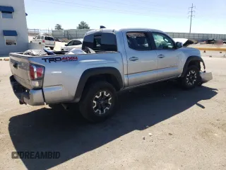 2022 Toyota Tacoma SR with VIN 3TMCZ5AN4NM470997, listed as a Copart auction lot 55165855 with 67,161 mi miles and Salvage title. Bid and sale history available at DreamBid. Image 3.