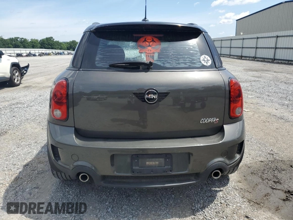 2012 MINI Countryman S with VIN WMWZC5C5XCWL56232, listed as a Copart auction lot 60298705 with 140,425 mi miles and Salvage title. Bid and sale history available at DreamBid. Image 6.