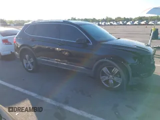 2018 Volkswagen Tiguan SEL Premium with VIN 3VV5B7AX1JM002585, listed as a IAAI auction lot 40495823 with 82,376 mi miles and . Bid and sale history available at DreamBid. Image 14.