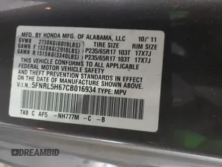 2012 Honda Odyssey EX-L with VIN 5FNRL5H67CB016934, listed as a IAAI auction lot 42405714 with 248,512 mi miles and . Bid and sale history available at DreamBid. Image 9.
