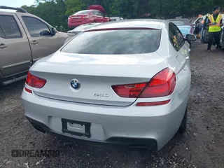 2014 BMW 6 Series 650i z VIN WBA6B2C58ED129639, wystawiony jako IAAI lot #42171786 z przebiegiem 108 677 mil mil oraz . Historia ofert i sprzedaży dostępna na DreamBid. Obrazek 16.
