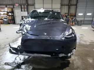 2023 Tesla Model Y Long Range z VIN 7SAYGAEE3PF968231, wystawiony jako Copart lot #45811385 z przebiegiem Nie podano mil oraz Szkoda całkowita • Salvage title. Historia ofert i sprzedaży dostępna na DreamBid. Obrazek 5.