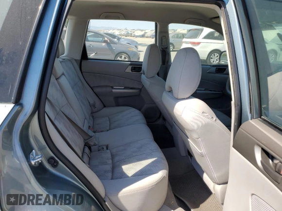 2009 Subaru Forester X with VIN JF2SH61619H757609, listed as a Copart auction lot 65048765 with 106,139 mi miles and Salvage title. Bid and sale history available at DreamBid. Image 11.