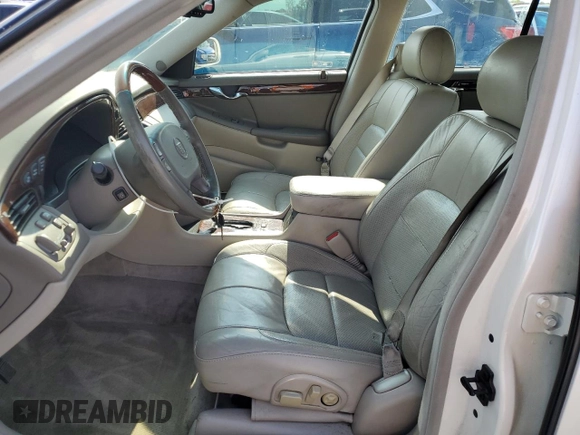 2003 Cadillac DeVille DTS z VIN 1G6KF57933U147843, wystawiony jako Copart lot #55875195 z przebiegiem 160 814 mil mil oraz Szkody całkowita. Historia ofert i sprzedaży dostępna na DreamBid. Obrazek 7.