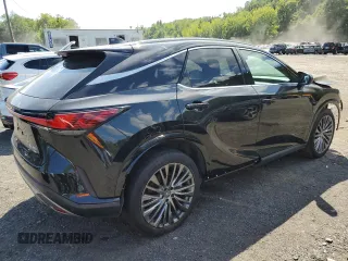 2024 Lexus RX with VIN 2T2BAMCA1RC044475, listed as a Copart auction lot 68661374 with 11,856 mi miles and Salvage Title. Bid and sale history available at carsss.com. Image 3.
