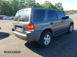 2004 Ford Escape XLT with VIN 1FMCU031X4DA18148, listed as a IAAI auction lot 42566498 with 264,092 mi miles and . Bid and sale history available at DreamBid. Image 4.