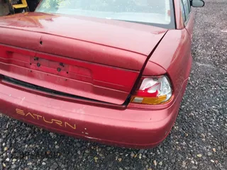 1996 Saturn SL with VIN 1G8ZK5273TZ268401, listed as a IAAI auction lot 42194239 with Not provided miles and . Bid and sale history available at DreamBid. Image 6.