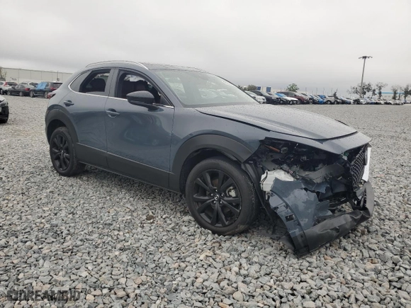 2023 Mazda CX-30 2.5 S Carbon Edition with VIN 3MVDMBCM9PM586736, listed as a Copart auction lot 46662055 with 0 mi miles and Salvage Title. Bid and sale history available at carsss.com. Image 4.