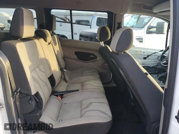 2015 Ford Transit Connect XLT с VIN NM0GS9F74F1178172, выставлен на аукционе Copart как лот 81821994 с пробегом 153 505 миль миль и Списание • Salvage title. История ставок и продаж доступна на DreamBid. Изображение 11.