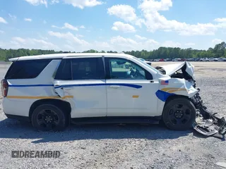 2022 Chevrolet Tahoe Commercial z VIN 1GNSCLED4NR222340, wystawiony jako IAAI lot #42321388 z przebiegiem Nie podano mil oraz . Historia ofert i sprzedaży dostępna na DreamBid. Obrazek 13.