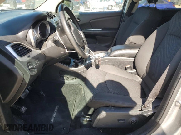 2017 Dodge Journey SXT with VIN 3C4PDCBG2HT521671, listed as a Copart auction lot 52565935 with 116,440 mi miles and Salvage Title. Bid and sale history available at DreamBid. Image 7.