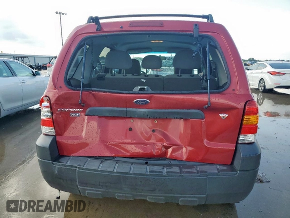 2006 Ford Escape XLT with VIN 1FMYU03196KA38458, listed as a Copart auction lot 64194705 with 102,097 mi miles and Salvage title. Bid and sale history available at DreamBid. Image 6.