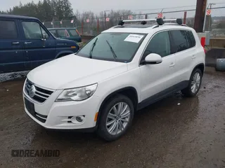 2011 Volkswagen Tiguan SE with VIN WVGBV7AXXBW546640, listed as a IAAI auction lot 41665036 with 106,071 mi miles and . Bid and sale history available at DreamBid. Image 2.