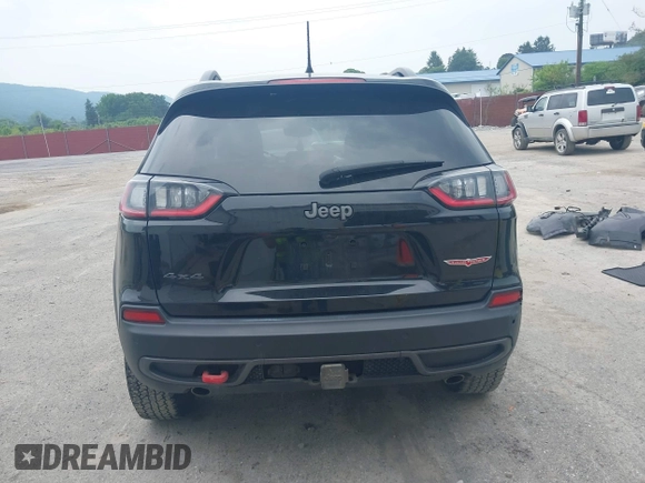2021 Jeep Cherokee Trailhawk with VIN 1C4PJMBX0MD167941, listed as a IAAI auction lot 42507379 with 70,414 mi miles and . Bid and sale history available at DreamBid. Image 17.
