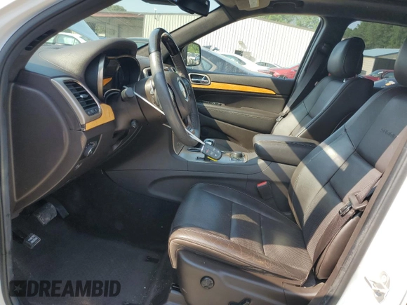 2014 Jeep Grand Cherokee Summit with VIN 1C4RJFJG9EC474781, listed as a Copart auction lot 60720325 with 64,546 mi miles and Salvage title. Bid and sale history available at DreamBid. Image 7.