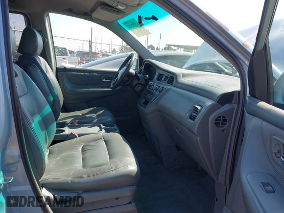 2003 Honda Odyssey EX-L with VIN 5FNRL18973B148675, listed as a IAAI auction lot 41992952 with 232,013 mi miles and . Bid and sale history available at DreamBid. Image 5.