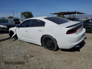2020 Dodge Charger SXT with VIN 2C3CDXBG4LH162979, listed as a Copart auction lot 54392705 with 69,169 mi miles and Salvage Title. Bid and sale history available at DreamBid. Image 2.