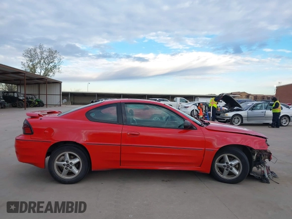 2004 Pontiac Grand Am z VIN 1G2NV12EX4M641018, wystawiony jako IAAI lot #41255352 z przebiegiem 144 385 mil mil oraz . Historia ofert i sprzedaży dostępna na DreamBid. Obrazek 14.