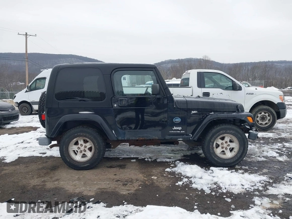 2005 Jeep Wrangler X with VIN 1J4FA39S55P353131, listed as a IAAI auction lot 41575949 with 154,026 mi miles and . Bid and sale history available at DreamBid. Image 13.