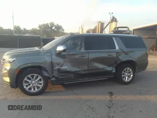 2023 Chevrolet Suburban Premier z VIN 1GNSKFKD8PR305863, wystawiony jako IAAI lot #37536455 z przebiegiem 13 765 mil mil oraz . Historia ofert i sprzedaży dostępna na DreamBid. Obrazek 6.