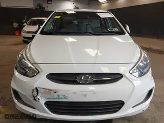 2015 Hyundai Accent GLS with VIN KMHCT4AE8FU876771, listed as a IAAI auction lot 42007229 with 63,484 mi miles. Bid and sale history available at carsss.com. Image 12.