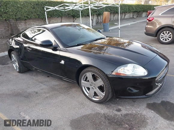 2008 Jaguar XK with VIN SAJWA43B985B23987, listed as a IAAI auction lot 41197091 with 54,803 mi miles. Bid and sale history available at carsss.com. Image 1.