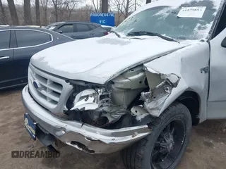 2002 Ford F-150 XL with VIN 1FTRX17212NA45843, listed as a IAAI auction lot 41575856 with 136,570 mi miles. Bid and sale history available at carsss.com. Image 6.