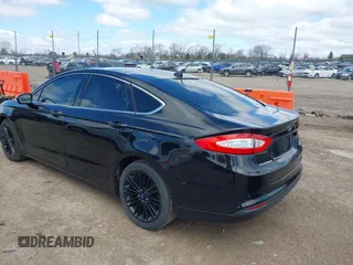 2014 Ford Fusion SE with VIN 3FA6P0HD1ER373400, listed as a IAAI auction lot 42046660 with 191,621 mi miles and . Bid and sale history available at DreamBid. Image 3.