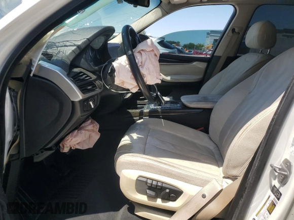 2014 BMW X5 xDrive35i with VIN 5UXKR0C52E0H20513, listed as a Copart auction lot 52831615 with 111,414 mi miles and Salvage Title. Bid and sale history available at carsss.com. Image 7.