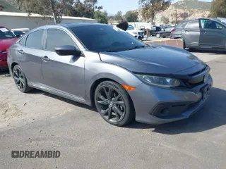 2019 Honda Civic Sedan Sport with VIN 2HGFC2F8XKH557203, listed as a IAAI auction lot 41846429 with 105,598 mi miles. Bid and sale history available at carsss.com. Image 1.