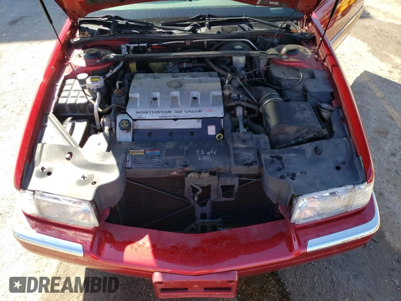 2002 Cadillac Eldorado z VIN 1G6EL12Y02B101569, wystawiony jako Copart lot #46216994 z przebiegiem 94 758 mil mil oraz Szkoda całkowita • Salvage title. Historia ofert i sprzedaży dostępna na DreamBid. Obrazek 11.