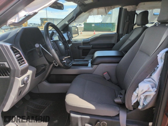 2016 Ford F-150 XLT with VIN 1FTEW1EG2GKD88539, listed as a Copart auction lot 56975835 with 142,775 mi miles and Salvage title. Bid and sale history available at DreamBid. Image 7.