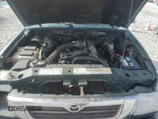 1999 Mazda B-Series Truck SX z VIN 4F4YR12CXXTM34917, wystawiony jako Copart lot #50821635 z przebiegiem 121 165 mil mil oraz Szkoda całkowita • Salvage title. Historia ofert i sprzedaży dostępna na DreamBid. Obrazek 11.