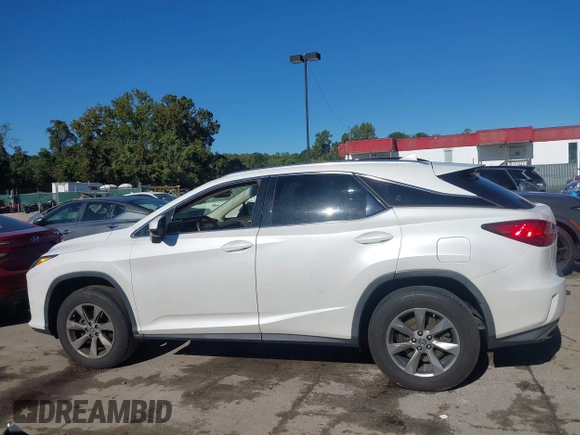 2019 Lexus RX with VIN JTJBZMCA0K2041369, listed as a IAAI auction lot 40557791 with 51,524 mi miles. Bid and sale history available at carsss.com. Image 14.