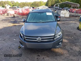 2013 Volkswagen Tiguan S with VIN WVGAV3AX7DW624136, listed as a IAAI auction lot 42256657 with 124,000 mi miles and . Bid and sale history available at DreamBid. Image 12.