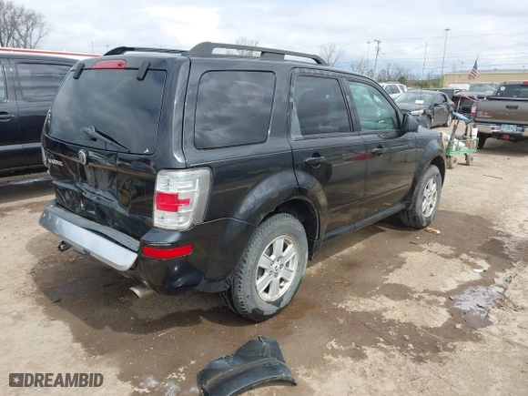 2011 Mercury Mariner with VIN 4M2CN8B7XBKJ01717, listed as a IAAI auction lot 42030587 with 115,766 mi miles. Bid and sale history available at carsss.com. Image 4.
