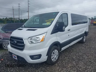 2020 Ford Transit Passenger XL with VIN 1FBAX2Y87LKA09619, listed as a IAAI auction lot 42743359 with 79,822 mi miles and . Bid and sale history available at DreamBid. Image 18.