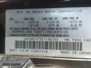 2014 Mazda Mazda3 i Sport with VIN JM1BM1U73E1186502, listed as a IAAI auction lot 38724333 with 999,999 mi miles. Bid and sale history available at carsss.com. Image 9.