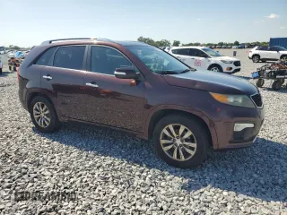 2011 Kia Sorento SX z VIN 5XYKW4A29BG127342, wystawiony jako Copart lot #57291455 z przebiegiem 291 922 mil mil oraz Czysty tytuł • Clean title. Historia ofert i sprzedaży dostępna na DreamBid. Obrazek 4.