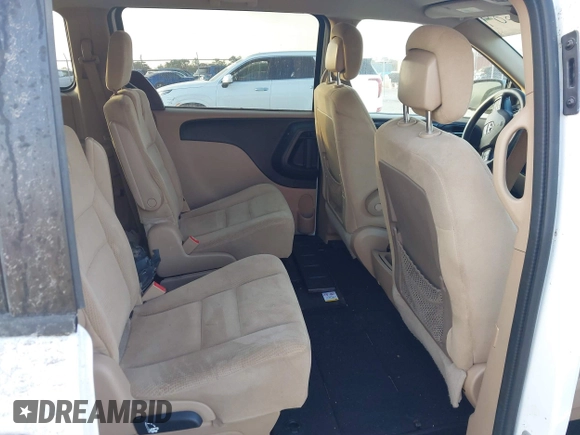 2016 Dodge Grand Caravan SXT with VIN 2C4RDGCGXGR257633, listed as a IAAI auction lot 41514684 with 108,743 mi miles and . Bid and sale history available at DreamBid. Image 8.