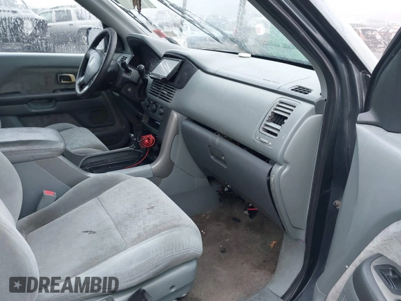 2003 Honda Pilot LX with VIN 2HKYF181X3H610581, listed as a IAAI auction lot 41743077 with 212,207 mi miles and . Bid and sale history available at DreamBid. Image 5.