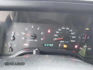 2006 Jeep Wrangler SE with VIN 1J4FA29156P762295, listed as a IAAI auction lot 41669950 with 163,492 mi miles and . Bid and sale history available at DreamBid. Image 7.