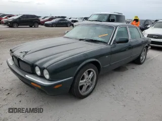 1998 Jaguar XJ with VIN SAJPX1842WC847795, listed as a Copart auction lot 75090864 with Not provided miles and Non repairable. Bid and sale history available at DreamBid. Image 1.