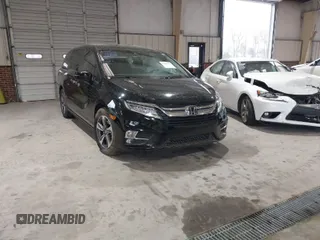 2018 Honda Odyssey Touring with VIN 5FNRL6H87JB105410, listed as a IAAI auction lot 41860707 with 91,908 mi miles. Bid and sale history available at carsss.com. Image 1.