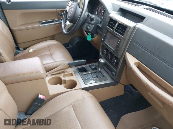 2011 Jeep Liberty Limited 70th Anniversary with VIN 1J4PN5GK0BW572037, listed as a IAAI auction lot 42187728 with 90,706 mi miles and . Bid and sale history available at DreamBid. Image 5.